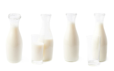 Glass of milk next to bottle isolated