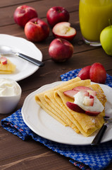 Cream pancakes with nectarines
