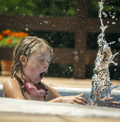 Little girl splashing