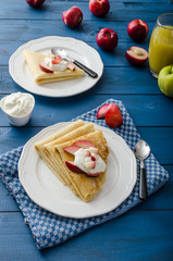Cream pancakes with nectarines