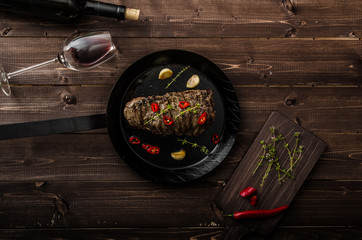 Beef steak with herbs and chilli, product photo