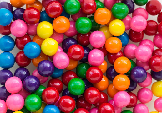 horizontal image of a background shot of colourful  array of bubble gum filling the whole composition