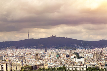 panorama of barcelona with heavy clouds in summer