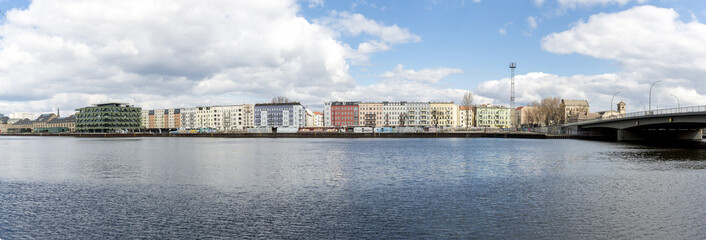 panorama of Berlin Treptow with canal in front