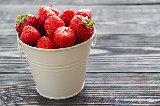 fresh sweet strawberry on wooden background