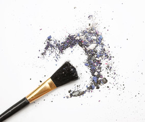 Professional make-up brush on mixed blue crushed eyeshadow