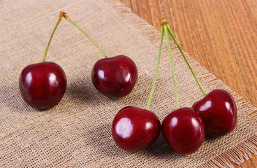 Fresh cherries on wooden table, healthy food