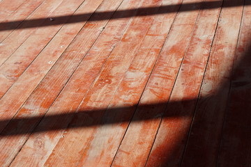shadow on wood floor