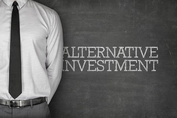Alternative investment text on blackboard