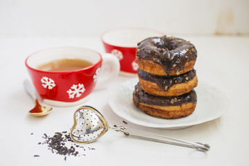 donuts and tea in a cup