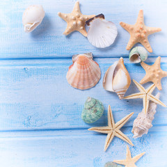 Marine items on blue wooden background