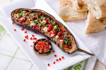 eggplant stuffed with vegetables and mushrooms, roasted vegetables