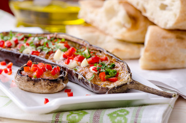 eggplant stuffed with vegetables and mushrooms, roasted vegetables