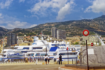 Cruise ships, yachts and personnel in the port