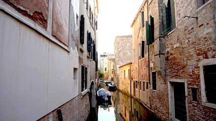 Fototapeta na wymiar Alley and canal with ancient architecture