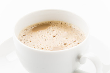 a cup of coffee on white