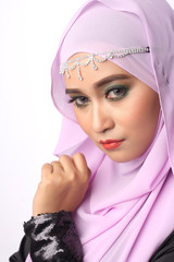 muslimah woman in natural expression Aidilfitri dress