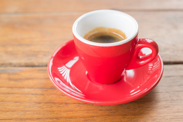 Fresh brewed hot espresso in red cup