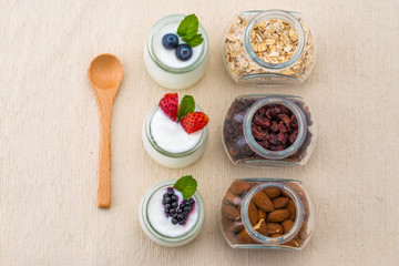 healthy breakfast with yogurt, berry and nuts, dieting