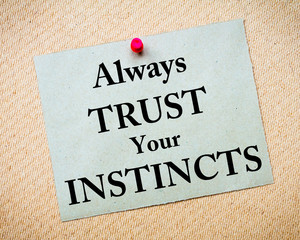 Always Trust Your Instincts Message written on paper note