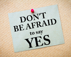 Don't Be Afraid To Say YES Message written on paper note