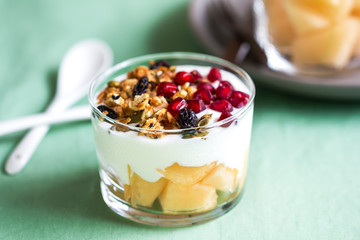 Granola with Greek yogurt and Cantaloupe