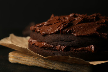Chocolate cake on table, close-up