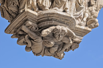 Gothic decoration relief on the wall of medieval building of city hall on Grand Place in Brussels on blue sky - 87768753