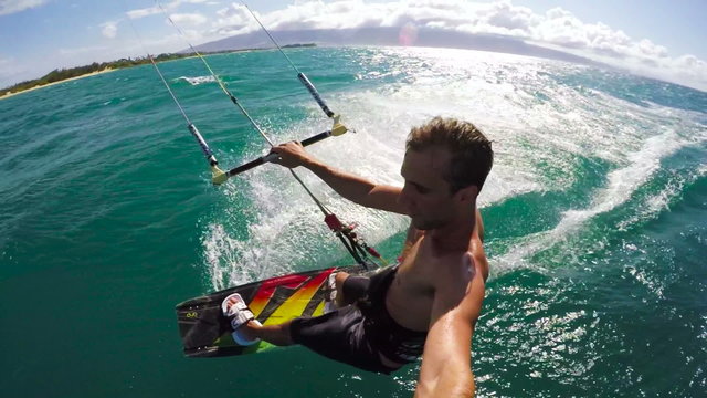 Slow Motion POV Shot of Young Man Kite Surfing