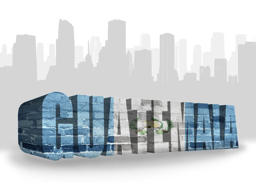 text guatemala with national flag of guatemala near abstract silhouette of the city