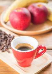 Fresh brewed hot espresso with roasted bean