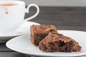brownies in plate on wood table