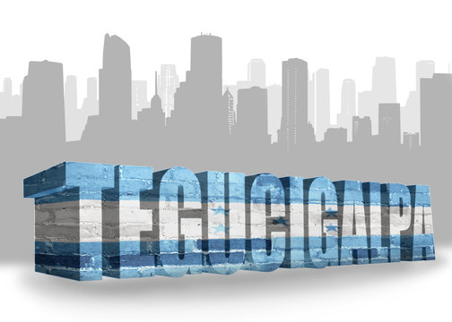 text tegucigalpa with national flag of honduras near abstract silhouette of the city