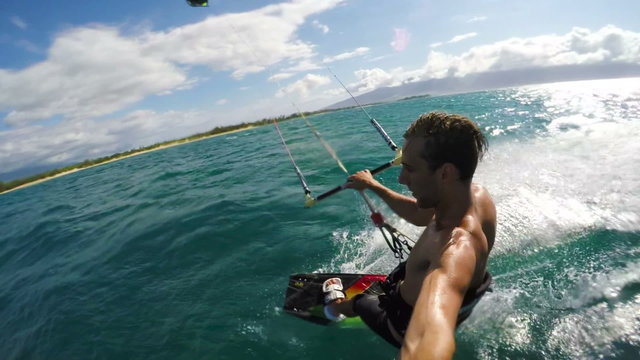 Slow Motion HD POV Shot of Young Man Kitesurfing in the Ocean