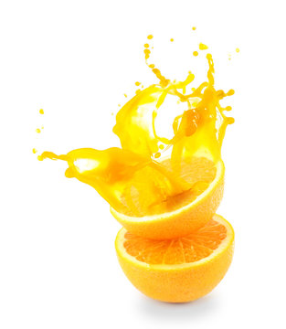 Orange juice splashes isolated on white