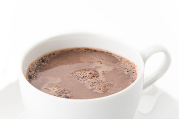 a cup of chocolate on white