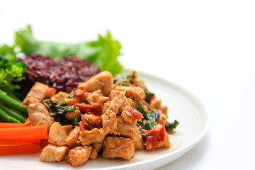 rice topped with stir-fried chicken and basil, one of clean food