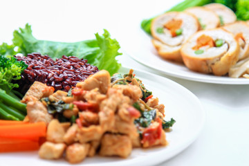 rice topped with stir-fried chicken and basil, one of clean food