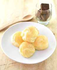 Choux Cream, Cream puff on wooden table