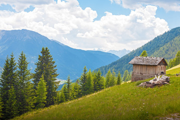 Fototapeta na wymiar Small wooden hut in the Dolomites