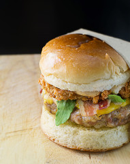 Delicious hamburger with a juicy pork patty and bacon