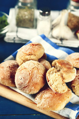 Fresh homemade bread buns on table, close-up