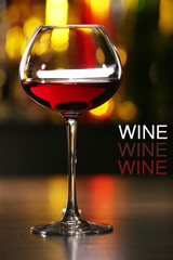 Glass of red wine in bar, close-up