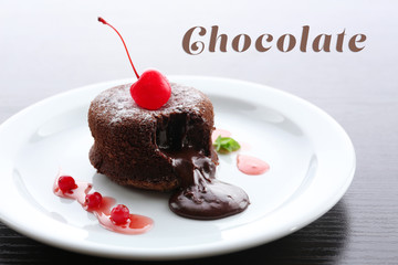 Hot chocolate pudding with fondant centre on plate, close-up
