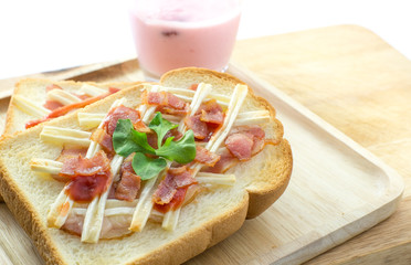 Toast bread with bacon, cheese and strawberry yogurt