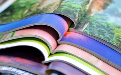 A pile of colorful magazines - close up