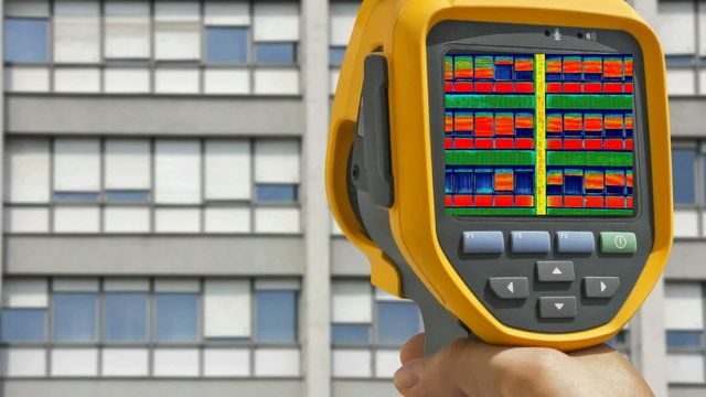 Recording on Residential building with Infrared camera  showing lack of thermal insulation, Full HD video