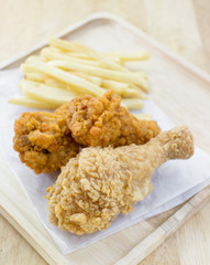 Crispy chicken and french fries, selective focus point