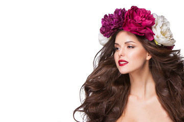 beautiful brunette young woman with wreath of peonies flowers