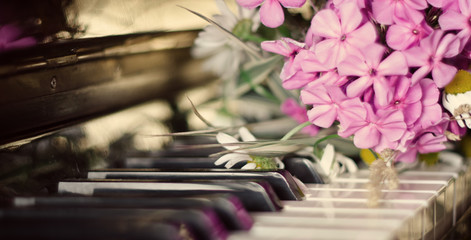 bouquet of summer flowers on a piano